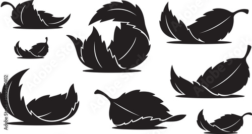 Collection of black leaf silhouettes on white background illustration