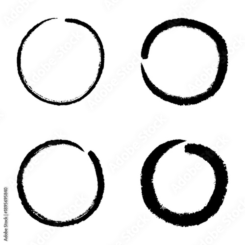 Black hand drawn ink brush stroke circle shapes set for logo design