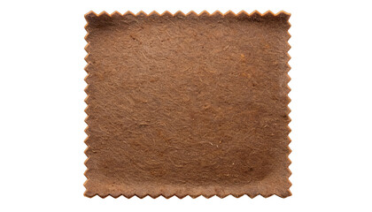 Square brown patch with wavy edges, textured surface, isolated on black background