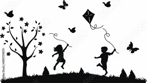 Children flying kite together in sunny meadow