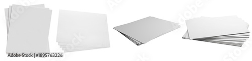Photography various views of blank white paper stacks and scattered sheets, perfect for mockups and office-related designs