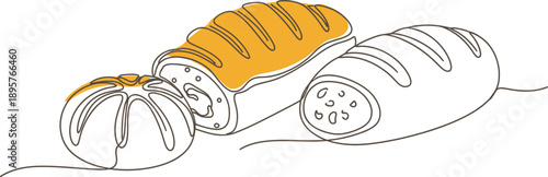 Freshly baked bread rolls with one toasted