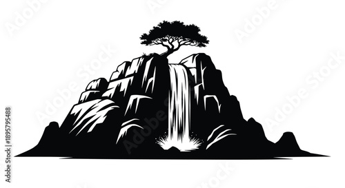 Powerful black silhouette of a waterfall cascading down a rugged rocky cliff with a single tree growing on top.