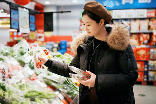Woman Shopping for Fresh Vegetables in Supermarket
