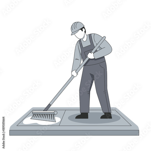 Construction Worker Applying Sealant to Pavement Area