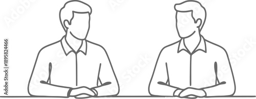 Two men sitting at table and talking to each other