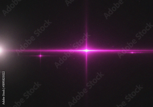 Obraz na plátne Vibrant Pink Leak Light Background with Starburst Effect on Black for Modern Des