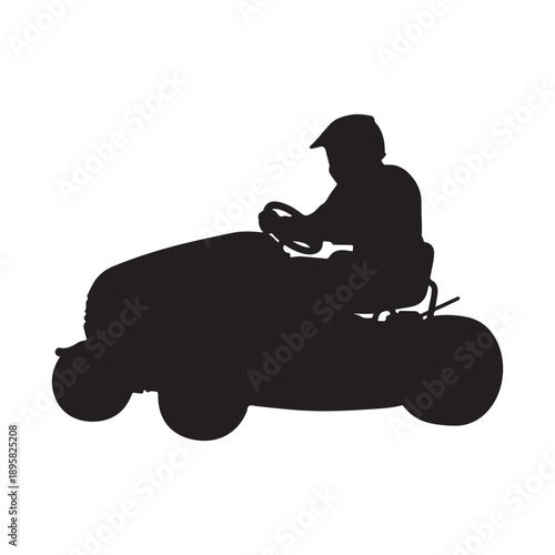 Silhouette of a person wearing a helmet driving a ride-on lawnmower in a competitive race.