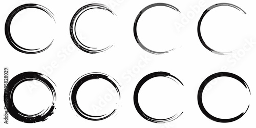 Abstract arrangement of black brushstroke circles on a plain white background