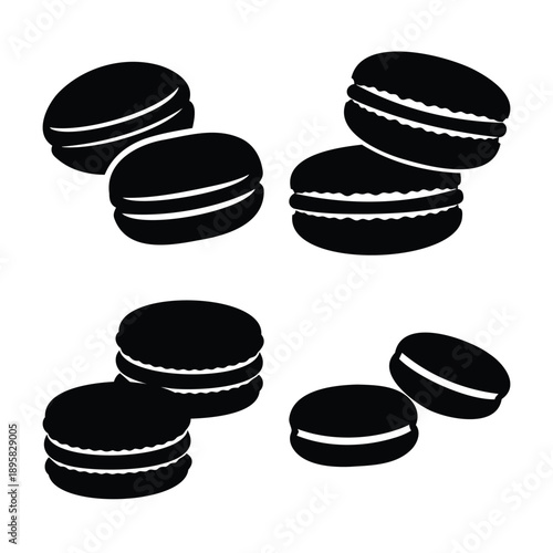 Set of stylized black silhouette macarons or sandwich cookies with white filling outline
