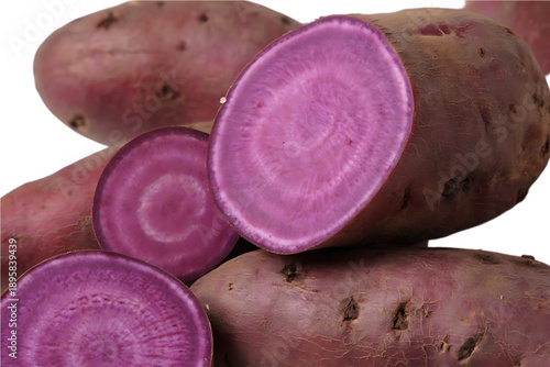 A whole and sliced purple sweet potato, showing its vibrant purple flesh, isolated as a transparent PNG.