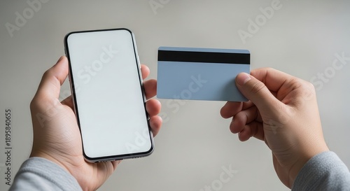 Hand holding a smart mobile phone with a blank digital touch screen display for business communication and wireless technology