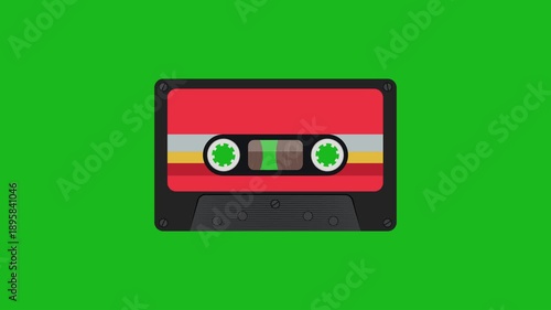 Animation of vintage audio cassette tape playing on green background
