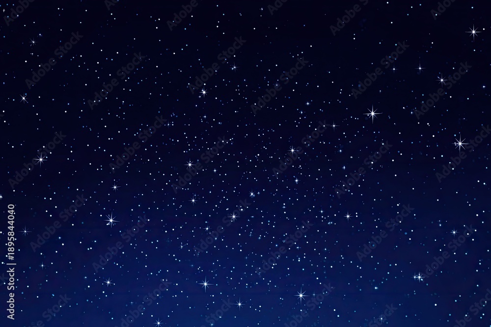 Fototapeta premium A dark night sky filled with twinkling white and light blue stars of varying sizes