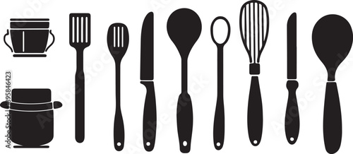 A professional set of kitchen utensils including a fork, spoon, and knife isolated on a white background as elegant silver cutlery for restaurant dining and metal dishware equipment