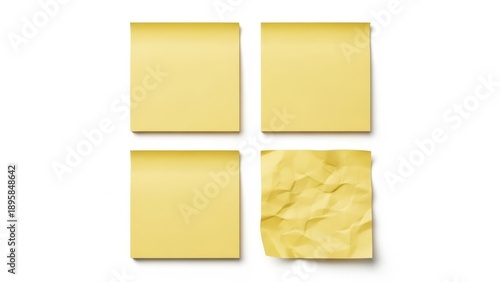 Four yellow sticky notes, one crumpled isolated on white background