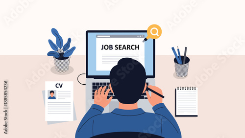 Professional man working at a tidy desk with a laptop, searching for employment online with his printed CV and a notebook by his side.