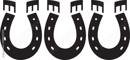 Three black metal horseshoes with nails on white background