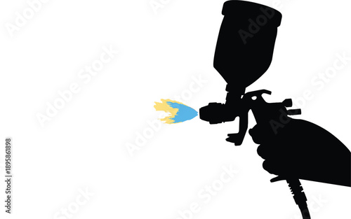 Spray paint gun spraying colorful paint