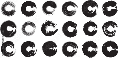 Collection of 20 black circular shapes with white centers on a white background