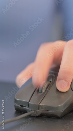 Close up of Woman Using Computer Mouse, vertical video