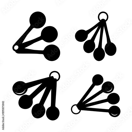 Four groups of measuring spoons attached with a ring for baking