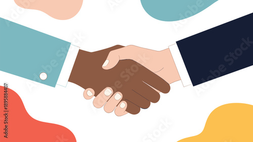 Handshake between two people of different ethnic backgrounds symbolizing agreement partnership peace and diversity.