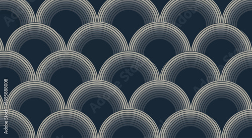 Art Deco inspired geometric scallop pattern in shades of grey on a dark blue background