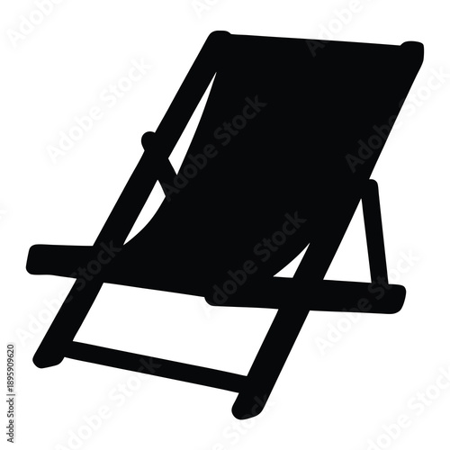 Silhouette of a folding beach chair, ready for relaxing vacation days