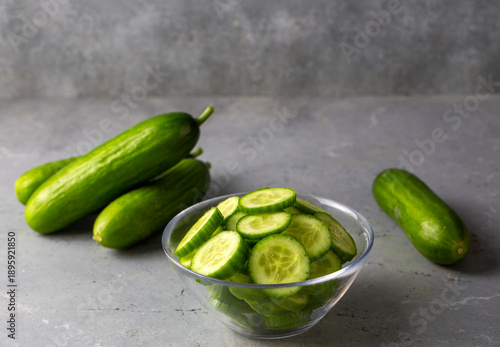 Fresh cucumber slices in bowl