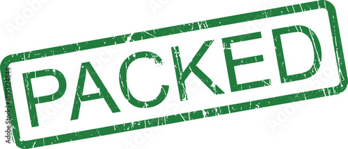 A rectangular green grunge rubber stamp with the bold text PACKED clearly visible against a clean white background surface