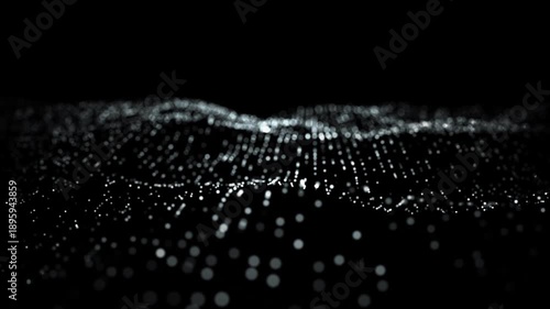 Cinematic monochrome digital particle wave motion background for futuristic business, technology, and big data visualization.