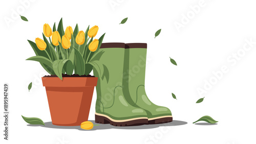 Terracotta pot filled with yellow tulips next to a pair of green rubber boots with falling leaves in the breeze for a spring gardening theme.