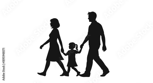 A happy family of three walking together in silhouette