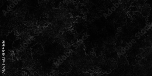 Dark grunge texture with deep black and charcoal tones, featuring rough, cracked surfaces and subtle scratches. cement concrete wall and ceramic tiles background. gray dirty stan, rusty metal texture.