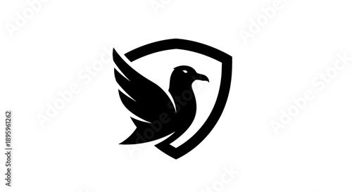 Black silhouette of a bird within a shield shape