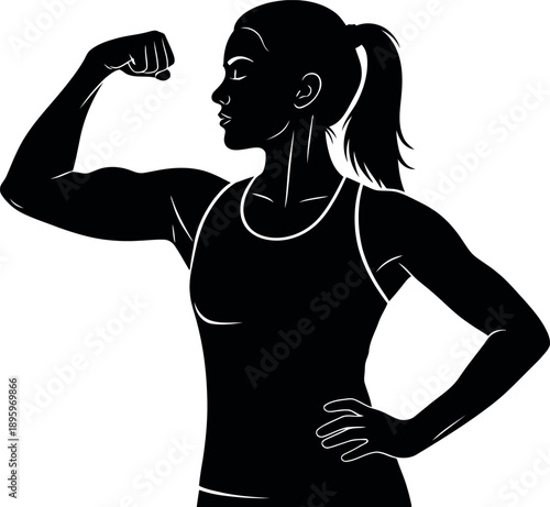 Strong woman flexing her bicep in a powerful pose with confidence and determination