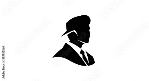 Silhouette of a man in a suit with a hat