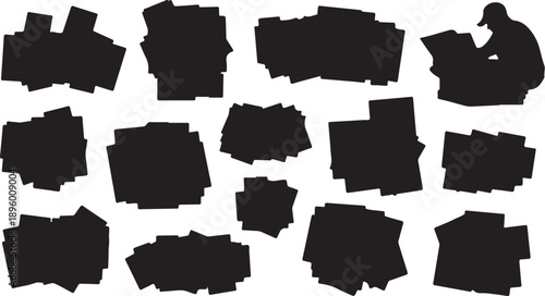 Collection of black torn paper shapes on white background