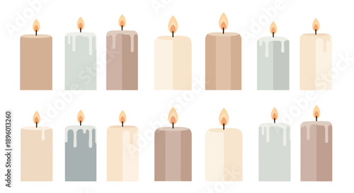 A collection of lit candles in various colors and sizes arranged in two rows on a plain background viewed from directly above