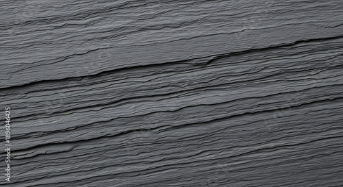 Detailed view of dark gray slate rock formation