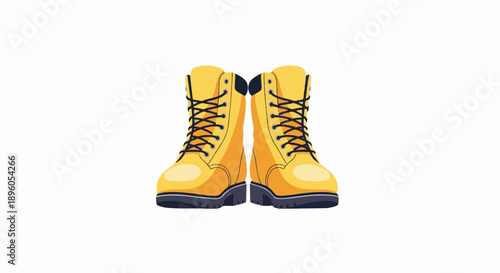 Pair of yellow work boots with black laces and soles