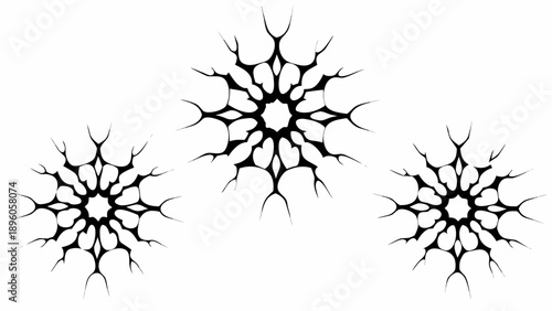 Three abstract black starburst shapes with spiky edges on a white background