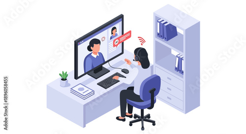 A woman participates in a video conference on her computer at a desk in an office setting.