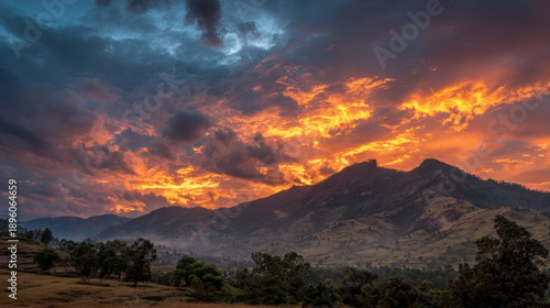 Dramatic Sunset Over Rolling Hills at Dusk