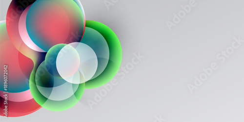 Abstract colorful circles overlap, creating vibrant visual effect. Gradient shades transition smoothly across shapes. Minimalist design.