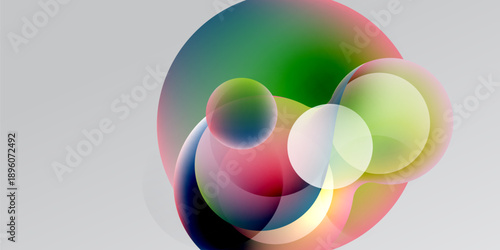 Abstract colorful circles overlap, creating vibrant gradients. Soft hues blend, forming fluid shapes against dark background.