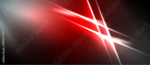 Abstract red light streaks cross dark background. Bright energy radiates from central intersection, creating dynamic visual effect.