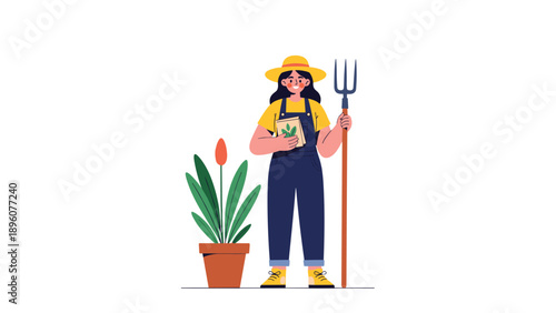 Cheerful woman gardener in overalls and a sun hat holding a pitchfork and seeds standing beside a large leafy plant in a pot.