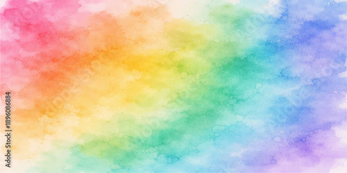 A bright rainbow spectrum of watercolor paint creates a seamless abstract background with a colorful grunge texture and blurred art design